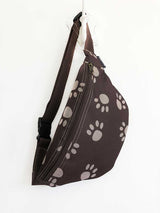Brown Animal paw printed fanny pack, designer sling bag with zipper pocket at ther front side