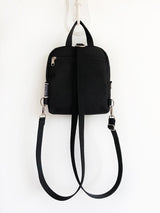 black backside of the vegan floral backpack