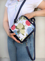 floral designer backpack for womens, round cute designer backpack with floral design, hydrangea round vegan shoulder bag
