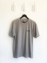 Gray shirt with phrase embroidery