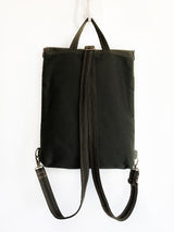 cotton vegan floral backpack with handle at the top flap closing and convertible starp to shoulder bag functional vegan bag